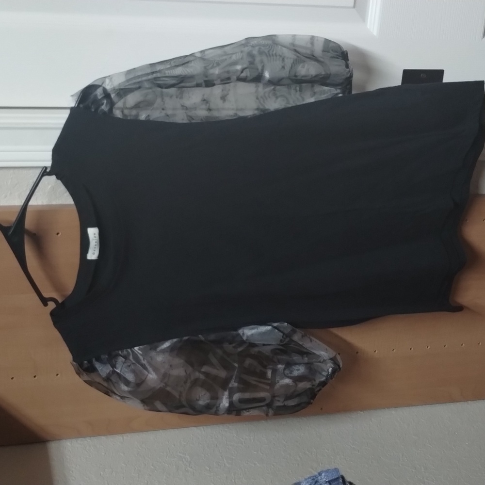 Black top with see through sleeves